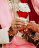 Wedding ritual of putting the ring on the finger in India
